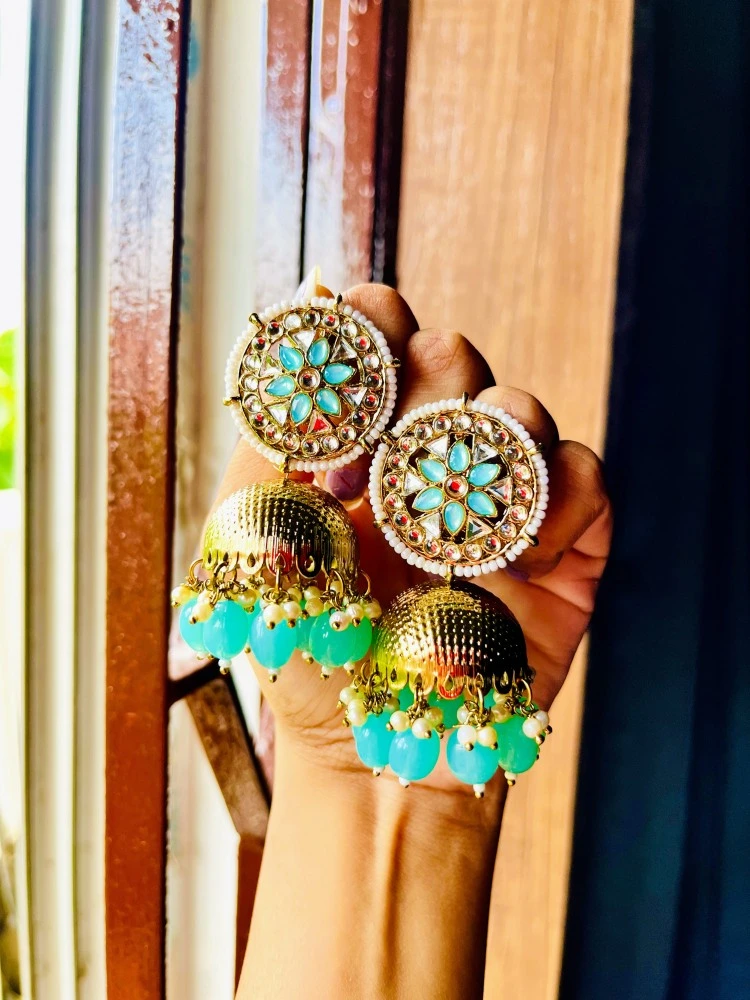 Kundan jhumkas in on sale gold